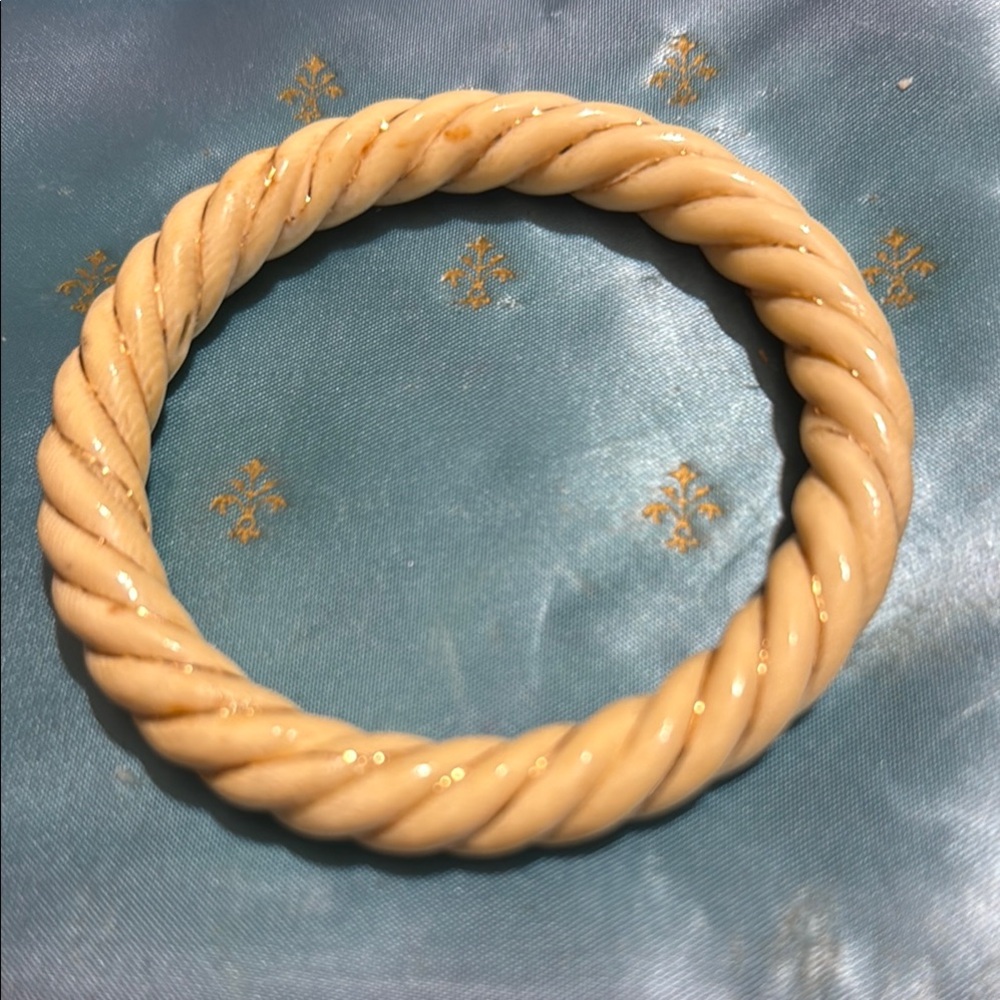 Elegant Cream Twisted Bangle